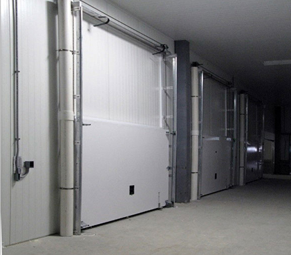 Puertas seccionales de andén para cámaras de secado